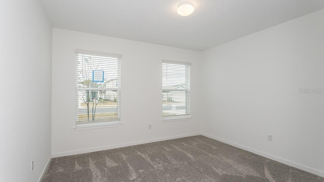 view of carpeted spare room