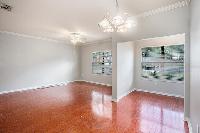 unfurnished room with crown molding, hardwood / wood-style floors, and a healthy amount of sunlight