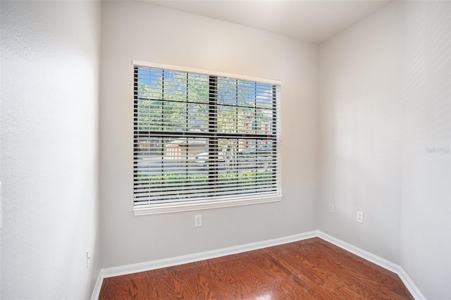 empty room featuring hardwood / wood-style floors