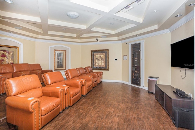 cinema room featuring dark wood-type flooring, ornamental molding, beamed ceiling, and coffered ceiling