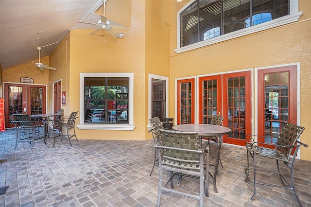 view of patio with ceiling fan and french doors