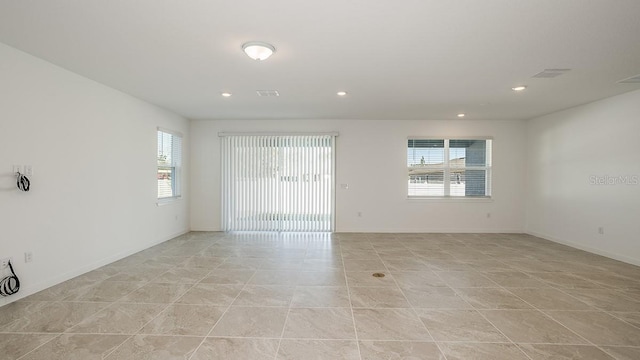 view of tiled empty room