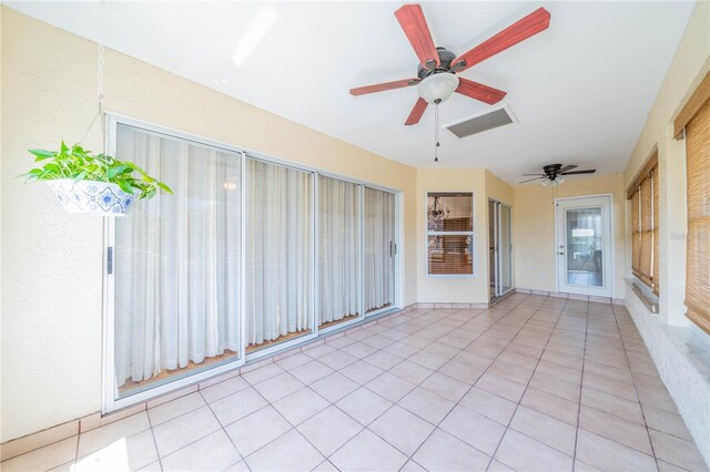 interior space featuring ceiling fan