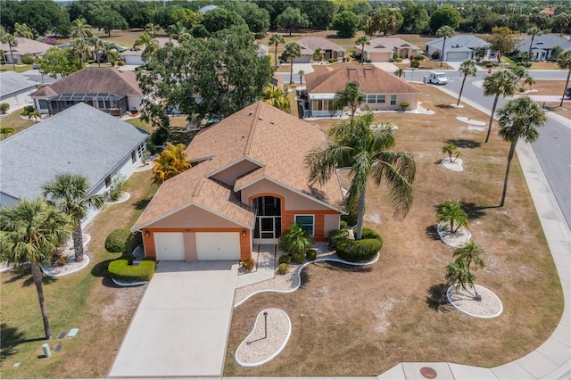 birds eye view of property with a residential view