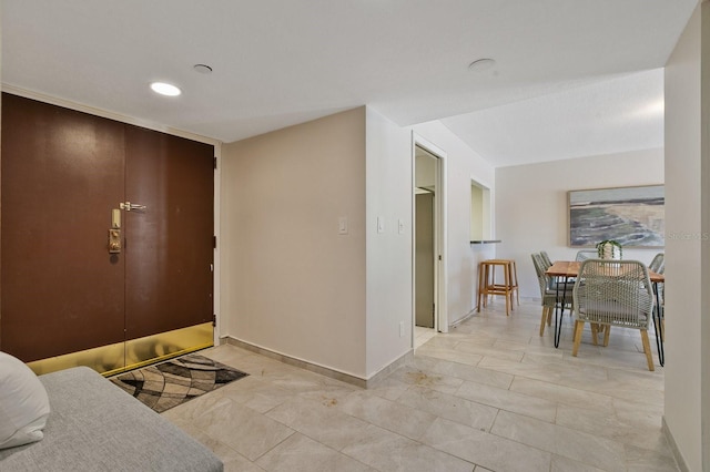 entrance foyer featuring light tile patterned floors