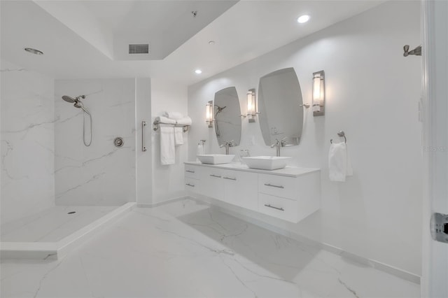 bathroom featuring recessed lighting, marble finish floor, visible vents, and a sink