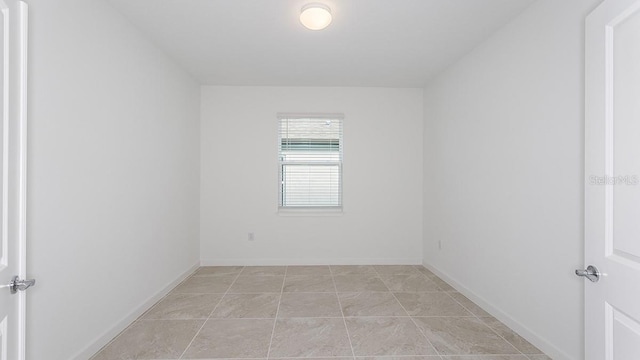 view of tiled spare room