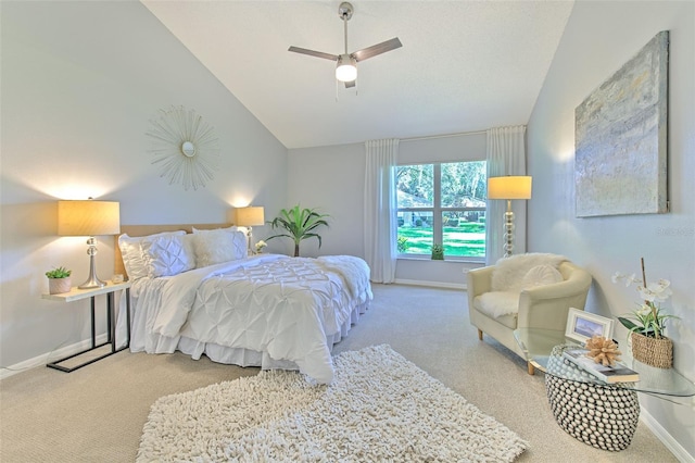 carpeted bedroom with lofted ceiling and ceiling fan