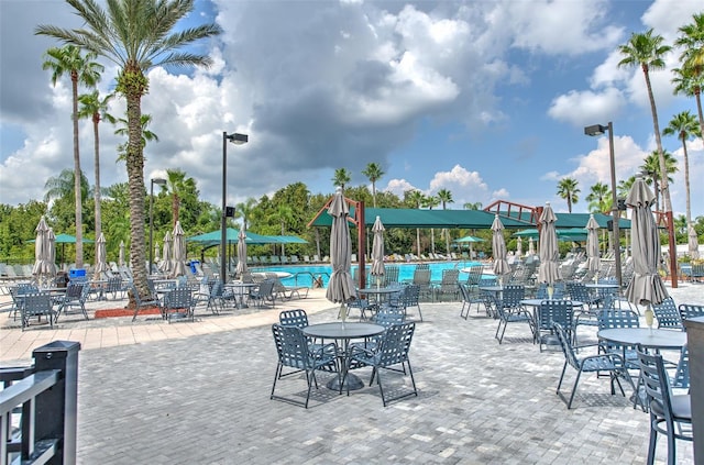 view of home's community featuring a pool