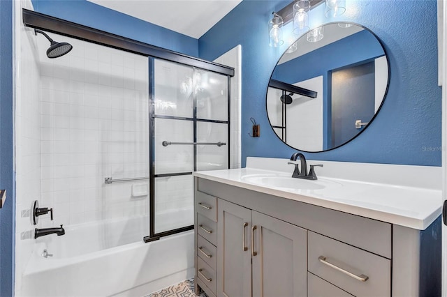2309 Mooney Pl, Sun City Center, FL 33573 - full bathroom featuring bath / shower combo with glass door and vanity