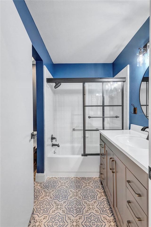 2309 Mooney Pl, Sun City Center, FL 33573 - full bath with vanity and combined bath / shower with glass door