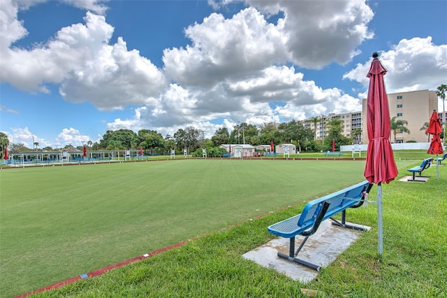 2309 Mooney Pl, Sun City Center, FL 33573 - view of home's community with a lawn