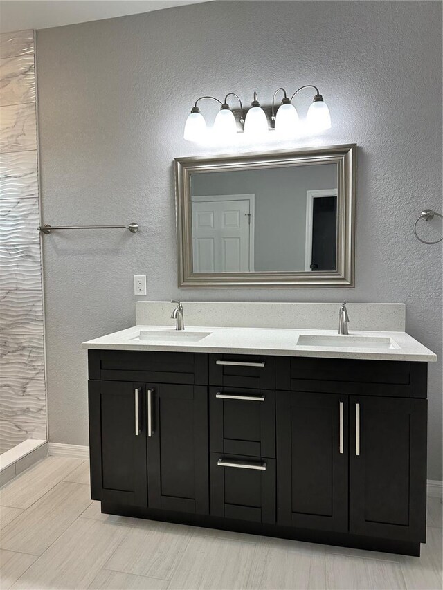 bathroom featuring vanity and tile patterned floors