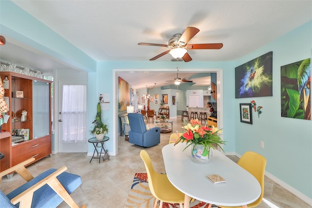 dining area featuring ceiling fan