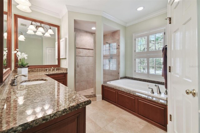 bathroom with tile patterned floors, independent shower and bath, vanity, and ornamental molding