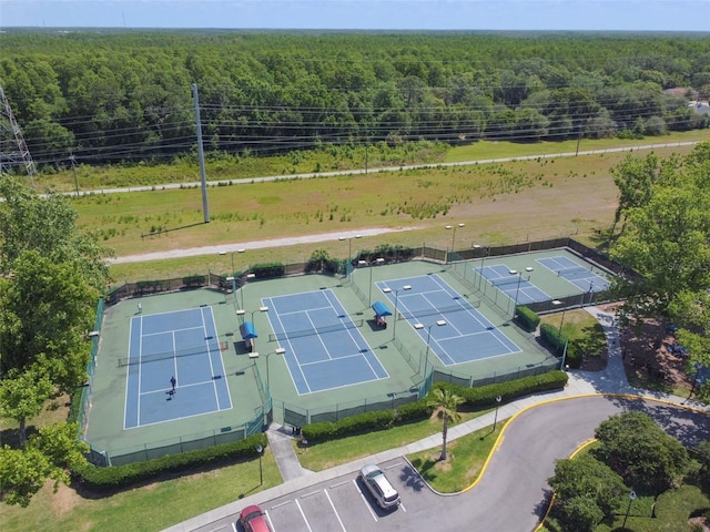 aerial view featuring a wooded view