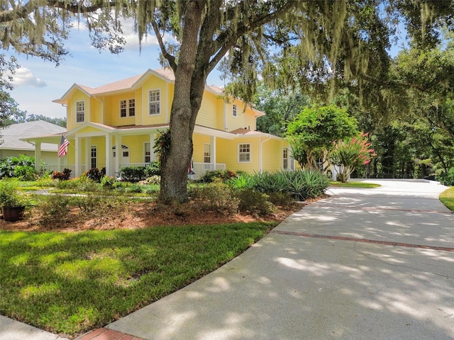 view of front of property with a front lawn