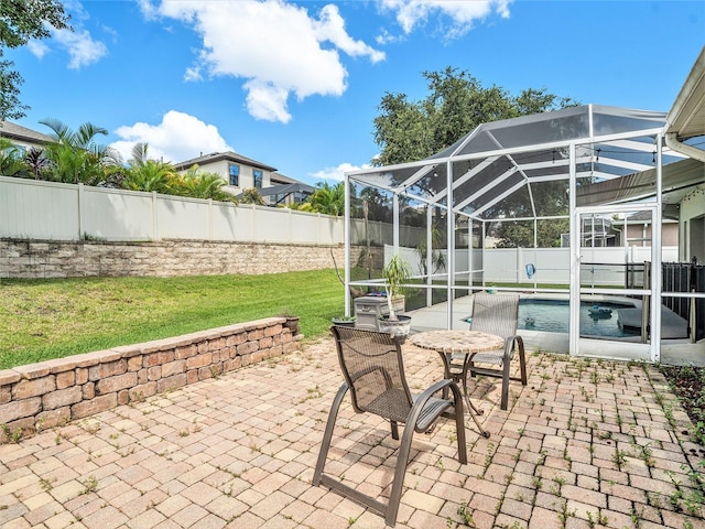 view of patio / terrace featuring a fenced in pool and a lanai