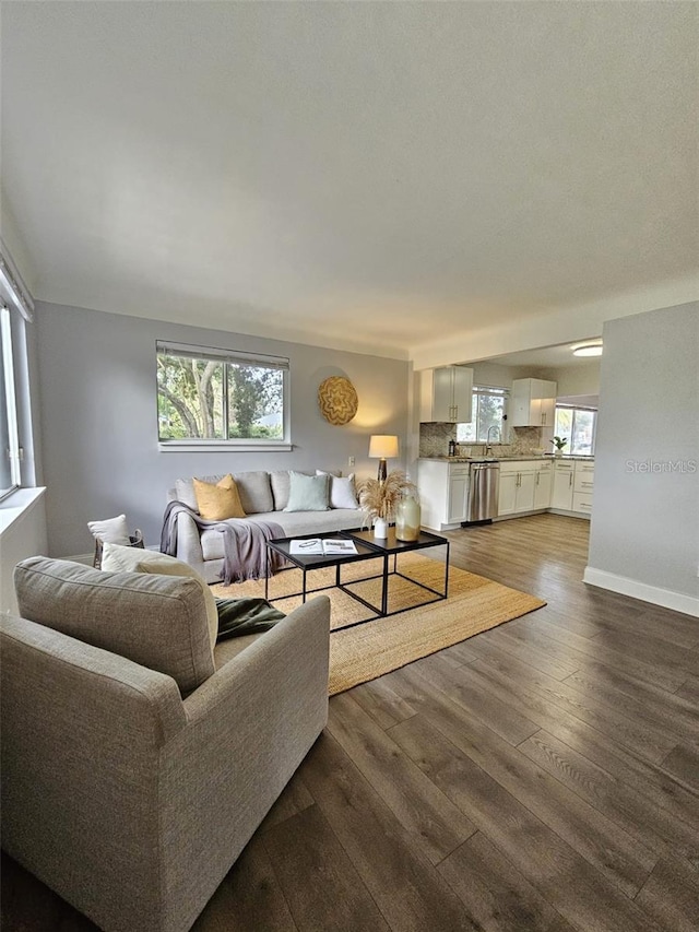 3763 Dartmouth Ave N, Saint Petersburg, FL 33713 - living area featuring wood finished floors and baseboards