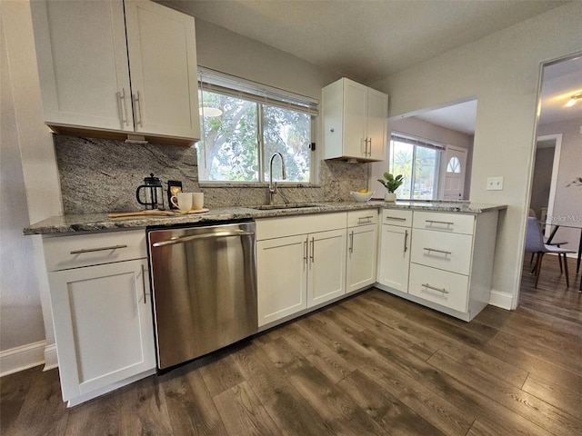 3763 Dartmouth Ave N, Saint Petersburg, FL 33713 - kitchen featuring dishwasher, a sink, tasteful backsplash, white cabinets, and light stone counters