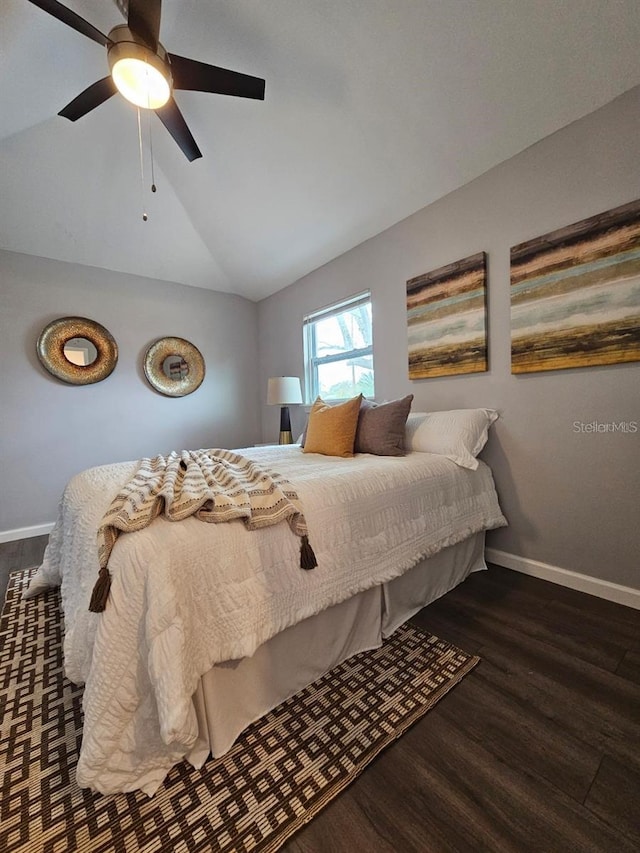 3763 Dartmouth Ave N, Saint Petersburg, FL 33713 - bedroom with wood finished floors, lofted ceiling, baseboards, and ceiling fan