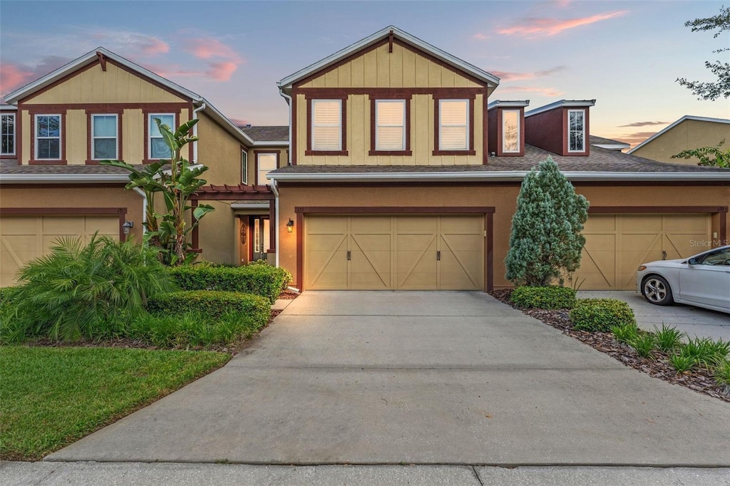 view of front of property with a garage