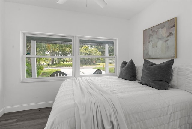 bedroom featuring ceiling fan and wood-type flooring