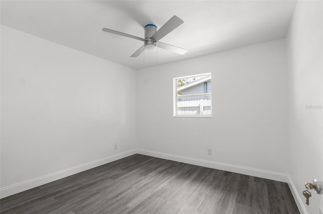 unfurnished room with ceiling fan and hardwood / wood-style flooring