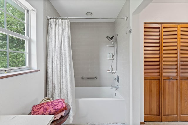 bathroom with shower / bath combo