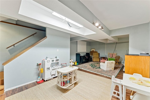 recreation room featuring hardwood / wood-style flooring