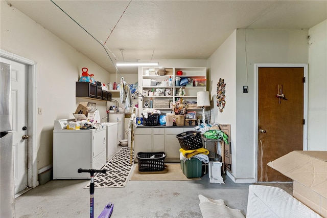 garage with separate washer and dryer