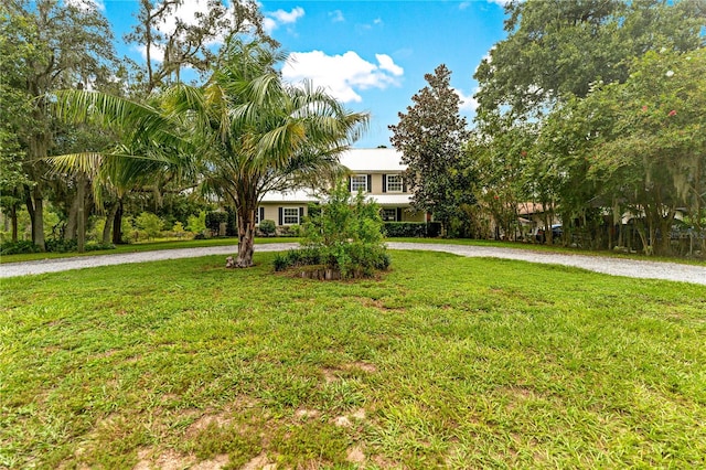 view of front of home with a front yard