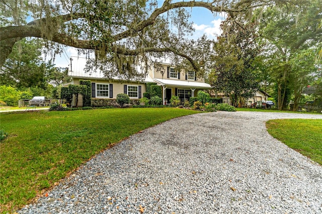 view of front of home featuring a front lawn