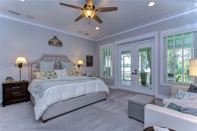 carpeted bedroom with access to exterior, ceiling fan, french doors, and ornamental molding