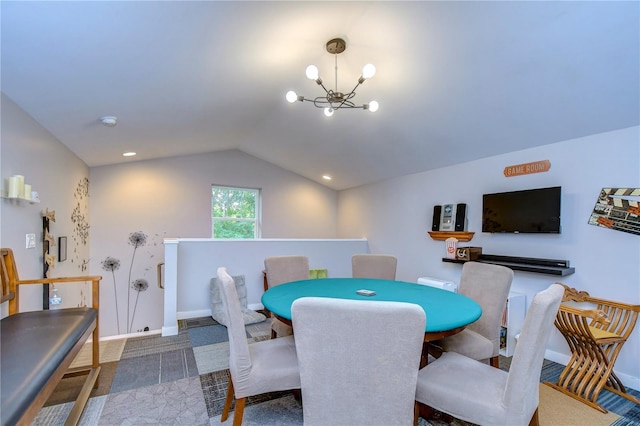 carpeted dining room with a chandelier and vaulted ceiling