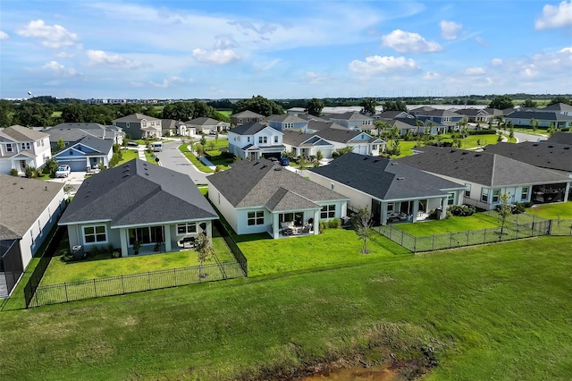 birds eye view of property with a residential view