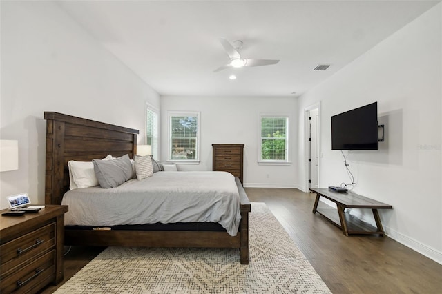 bedroom featuring hardwood / wood-style flooring and ceiling fan