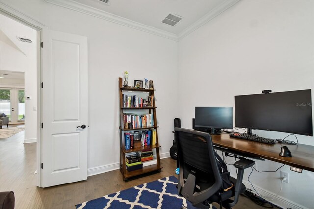 office area featuring ornamental molding and dark hardwood / wood-style flooring