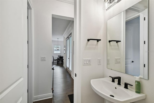 bathroom with sink and hardwood / wood-style flooring