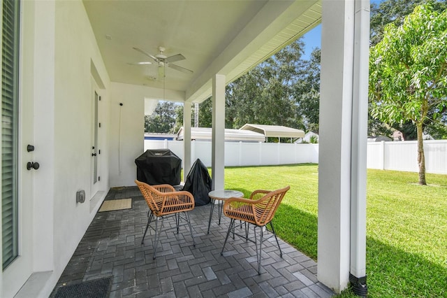 view of patio featuring ceiling fan and grilling area