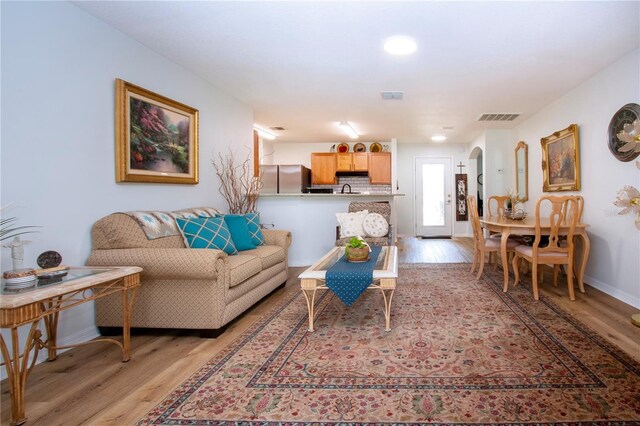 living room featuring light hardwood / wood-style flooring