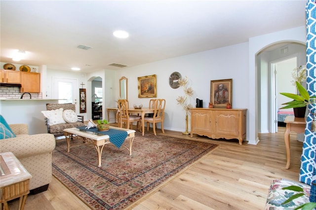 living room featuring light wood-type flooring