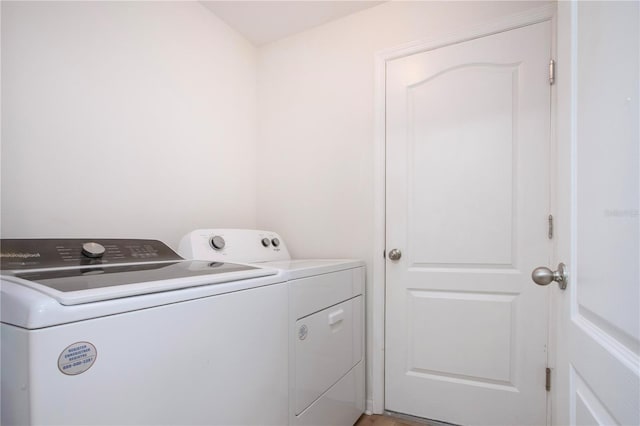 washroom with washer and clothes dryer