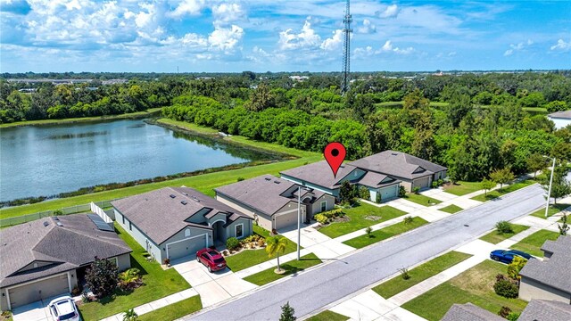 drone / aerial view featuring a water view