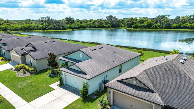 bird's eye view with a water view