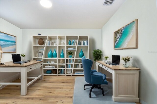 office area featuring light wood-type flooring