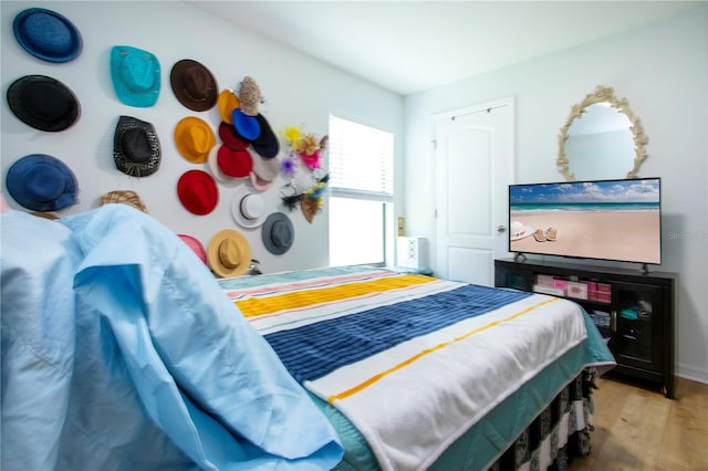 bedroom featuring hardwood / wood-style floors