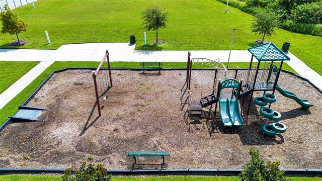 view of home's community featuring a playground