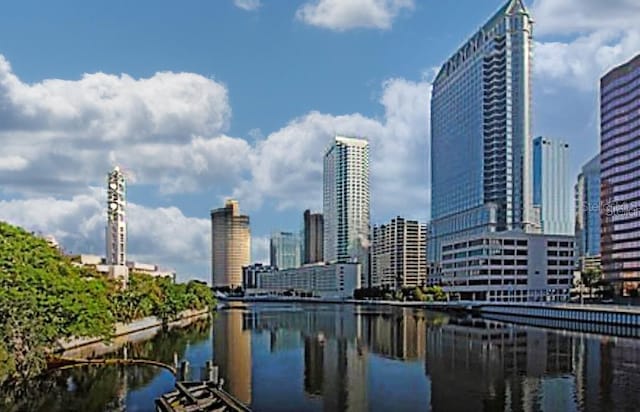 property's view of city with a water view