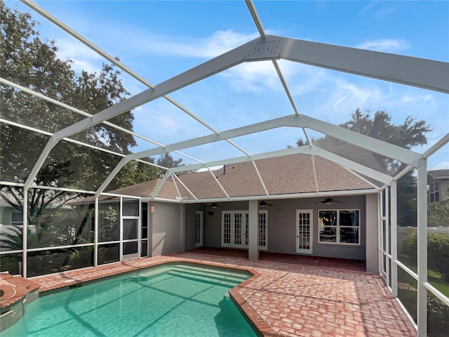 pool featuring a ceiling fan, french doors, a patio, and a lanai